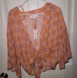 Pink rose Cover with tie and not size medium.